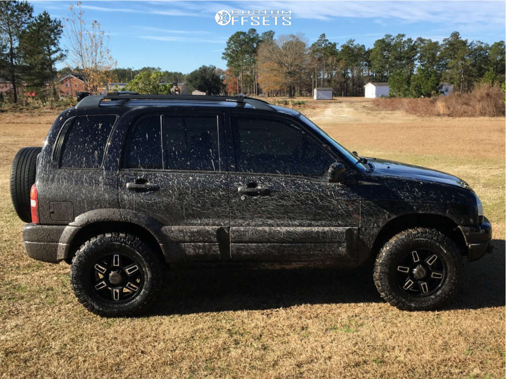 2001 Suzuki Grand Vitara with 16x8 American Racing Ar890 and 245/70R16  Centennial Dirt Commander M/t and Suspension Lift 3" | Custom Offsets
