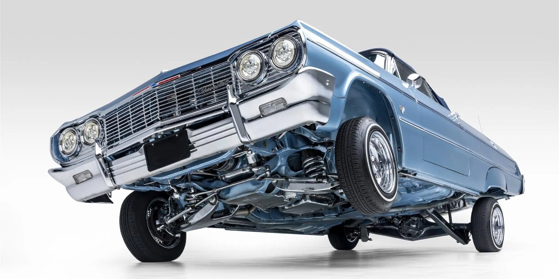 custom lowrider 1964 chevrolet impala convertible tilts and pumps over  three wheels