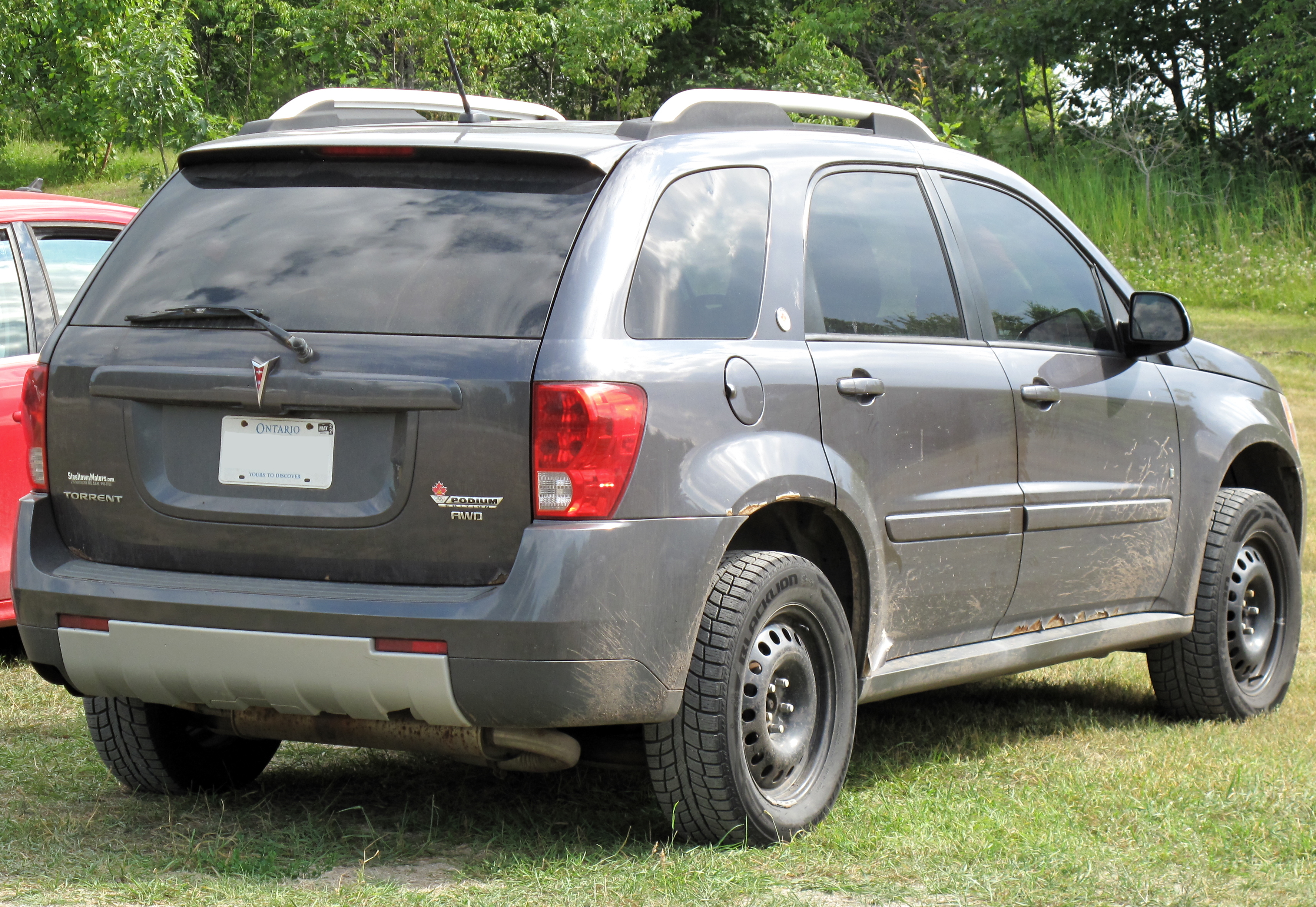 File:2008 Pontiac Torrent AWD Podium Edition in Granite Metallic, Rear  Right, 07-17-2022.jpg - Wikimedia Commons