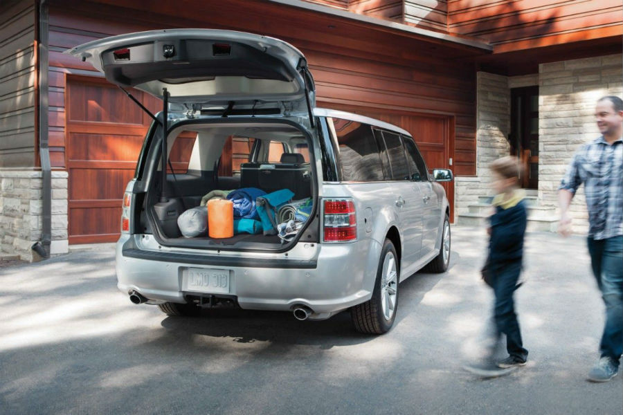 rear-view-of-a-silver-2019-Ford-Flex-with-its-rear-cargo-door-open_o -  Akins Ford