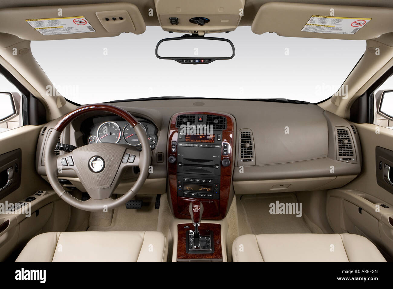 2006 Cadillac SRX Crossover V6 in Beige - Dashboard, center console, gear  shifter view Stock Photo - Alamy