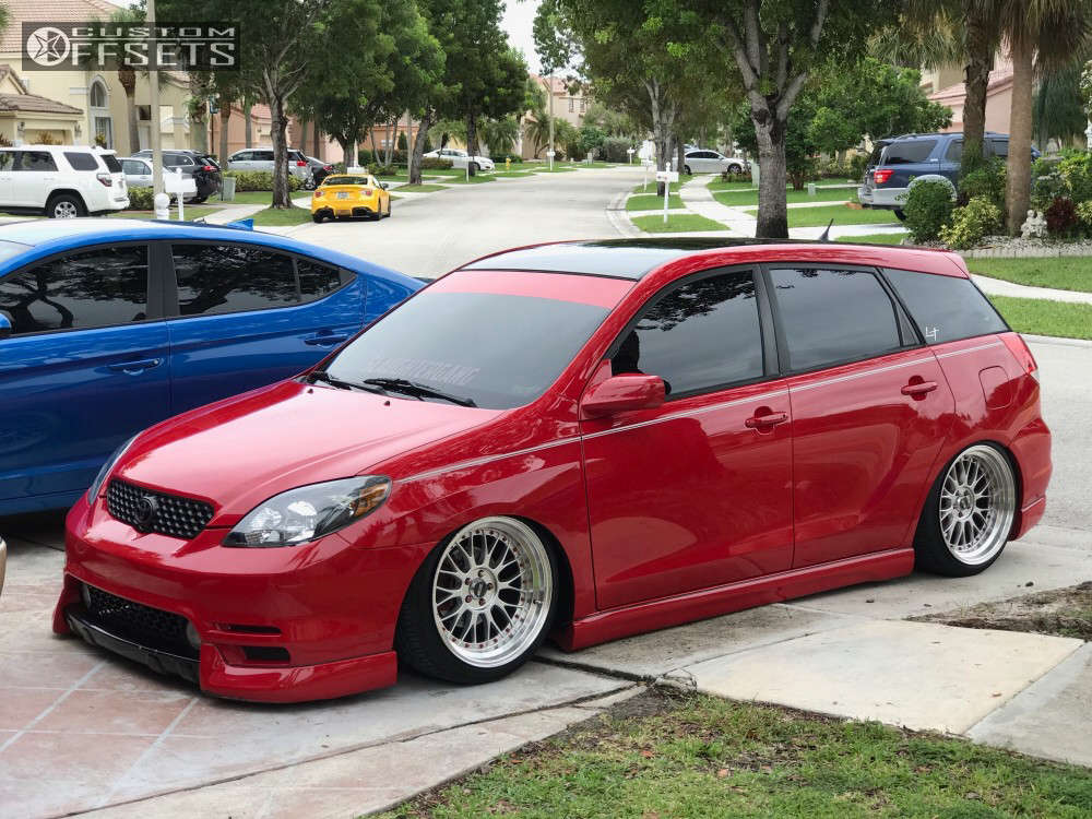 2003 Toyota Matrix with 18x10 25 XXR 521 and 225/40R18 Forgiato Tereno Mt  and Air Suspension | Custom Offsets