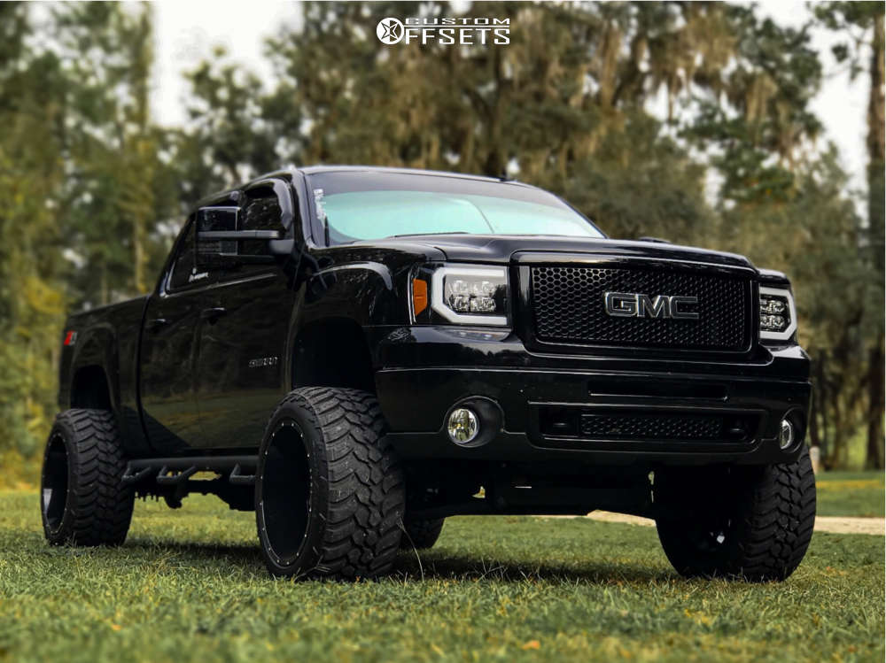 2011 GMC Sierra 1500 with 22x14 -76 Tuff T23 and 325/50R22 AMP Mud Terrain  Attack Mt A and Suspension Lift 6" | Custom Offsets