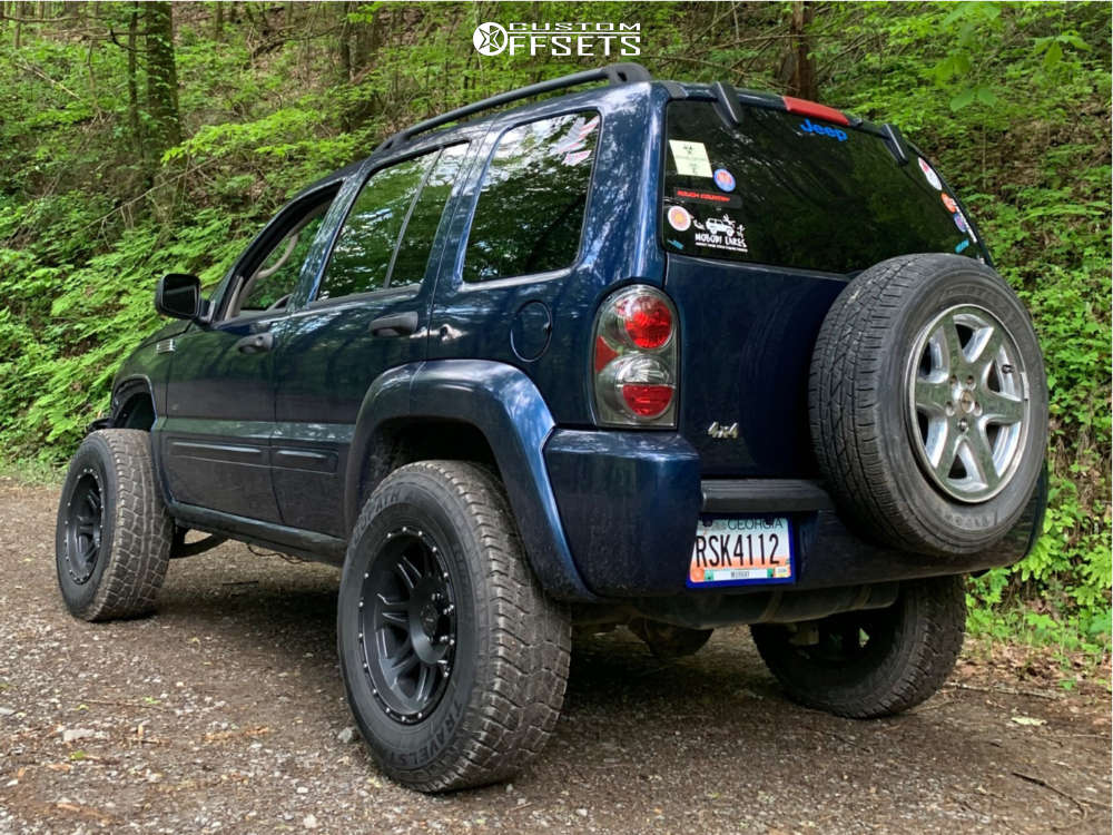 2003 Jeep Liberty with 17x9 -6 Pro Comp Series 05 and 265/70R17 Travelstar  Ecopath and Suspension Lift 3" | Custom Offsets