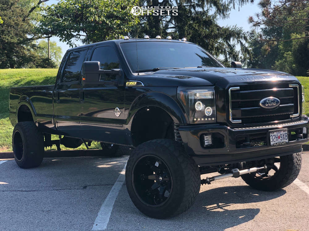 2011 Ford F-350 Super Duty with 22x14 -76 Fuel Octane and 37/13.5R22 Toyo  Tires Open Country M/T and Suspension Lift 8" | Custom Offsets