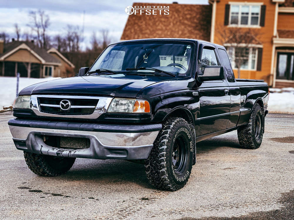 2010 Mazda B2300 with 15x10 -44 Pro Comp Series 97 and 31/10.5R15 Firestone  Destination MT2 and Stock | Custom Offsets