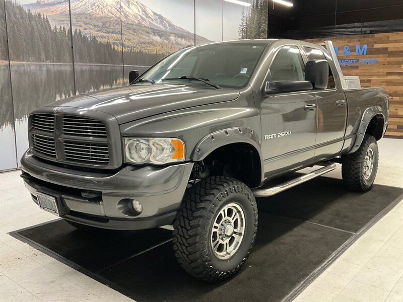 2003 Dodge Ram 2500 Laramie 4X4 / 5.9L DIESEL / Leather / LIFTED / BRAND  NEW 35" MUD TIRES / Leather & Heated Seats / RUST FREE / SHARP !!