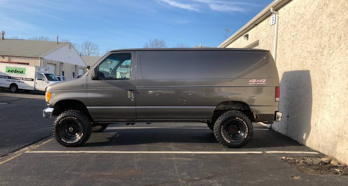 Gray 117K 1997 Ford E250 Quigley 4×4 For Sale | GuysWithRides.com