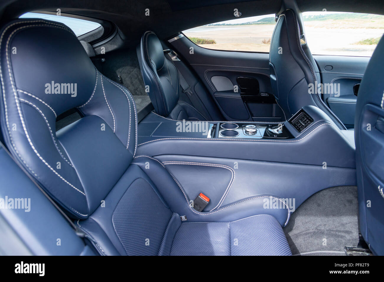 The rear seats of an Aston Martin Rapide S four door sports saloon car  photographed in The Vale of Glamorgan Stock Photo - Alamy