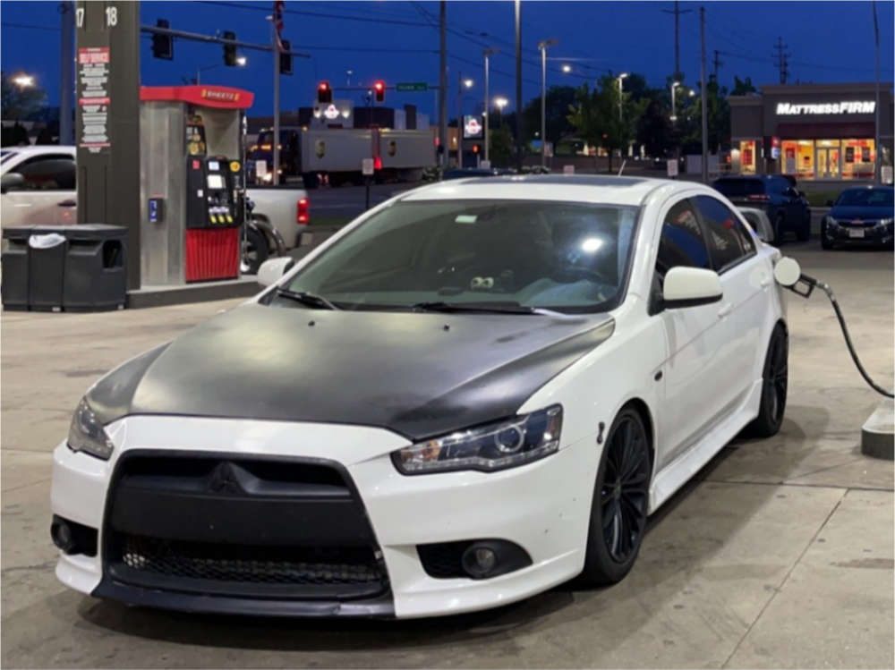 2014 Mitsubishi Lancer with 18x9 25 NS Ns1606 and 225/45R18 Lexani  Lx-twenty and Coilovers | Custom Offsets