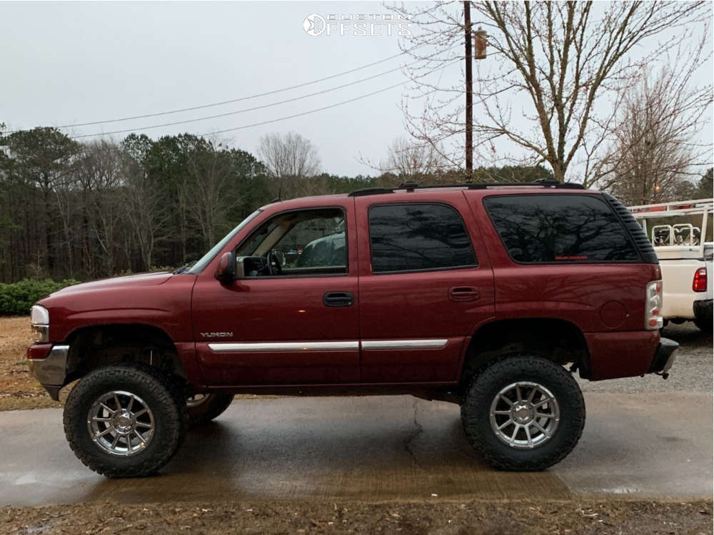 2003 GMC Yukon XL 1500 with 18x9 V-Rock Tactical and 35/11.5R18 Nitto Trail  Grappler and Suspension Lift 6" | Custom Offsets