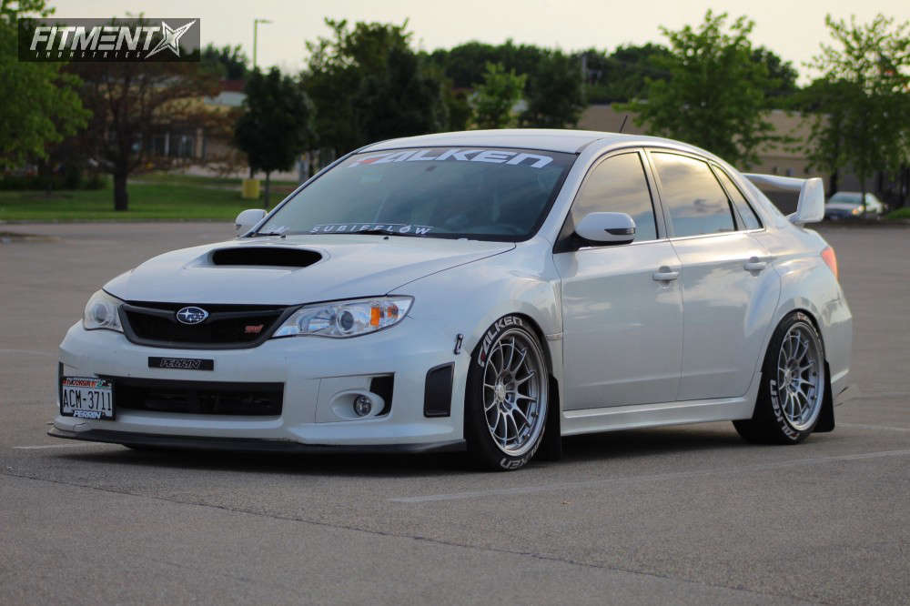 2012 Subaru WRX STI Base with 18x9.5 Enkei NT03M and Falken 235x40 on  Coilovers | 461170 | Fitment Industries