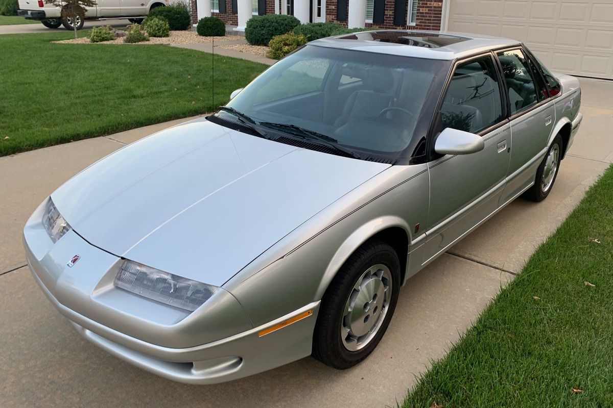 In its day, a 1993 Saturn SL2 was nothing special. That's what makes it  very special to one family | Hemmings