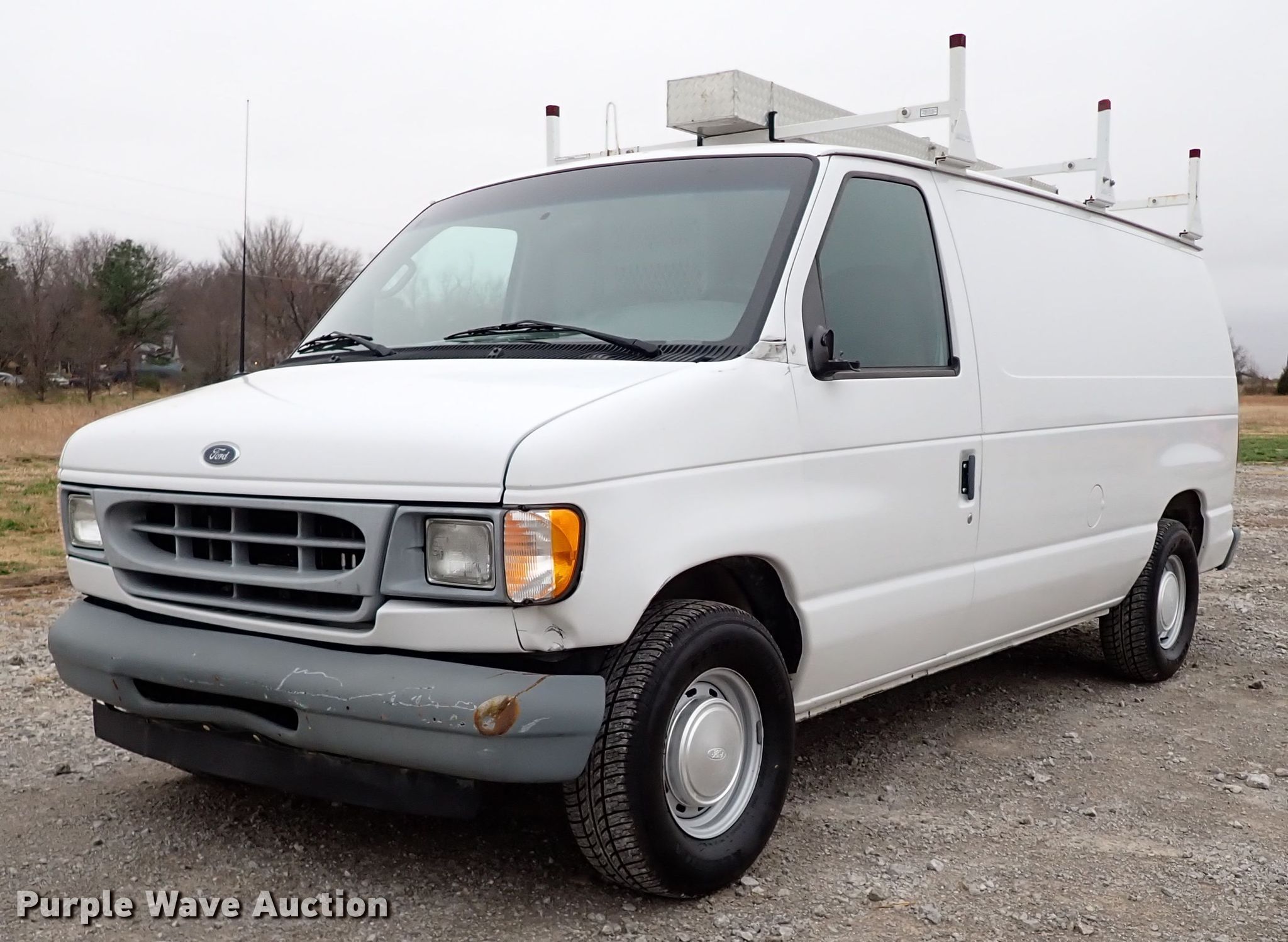 2002 Ford E150 van in Collinsville, OK | Item IS9310 sold | Purple Wave