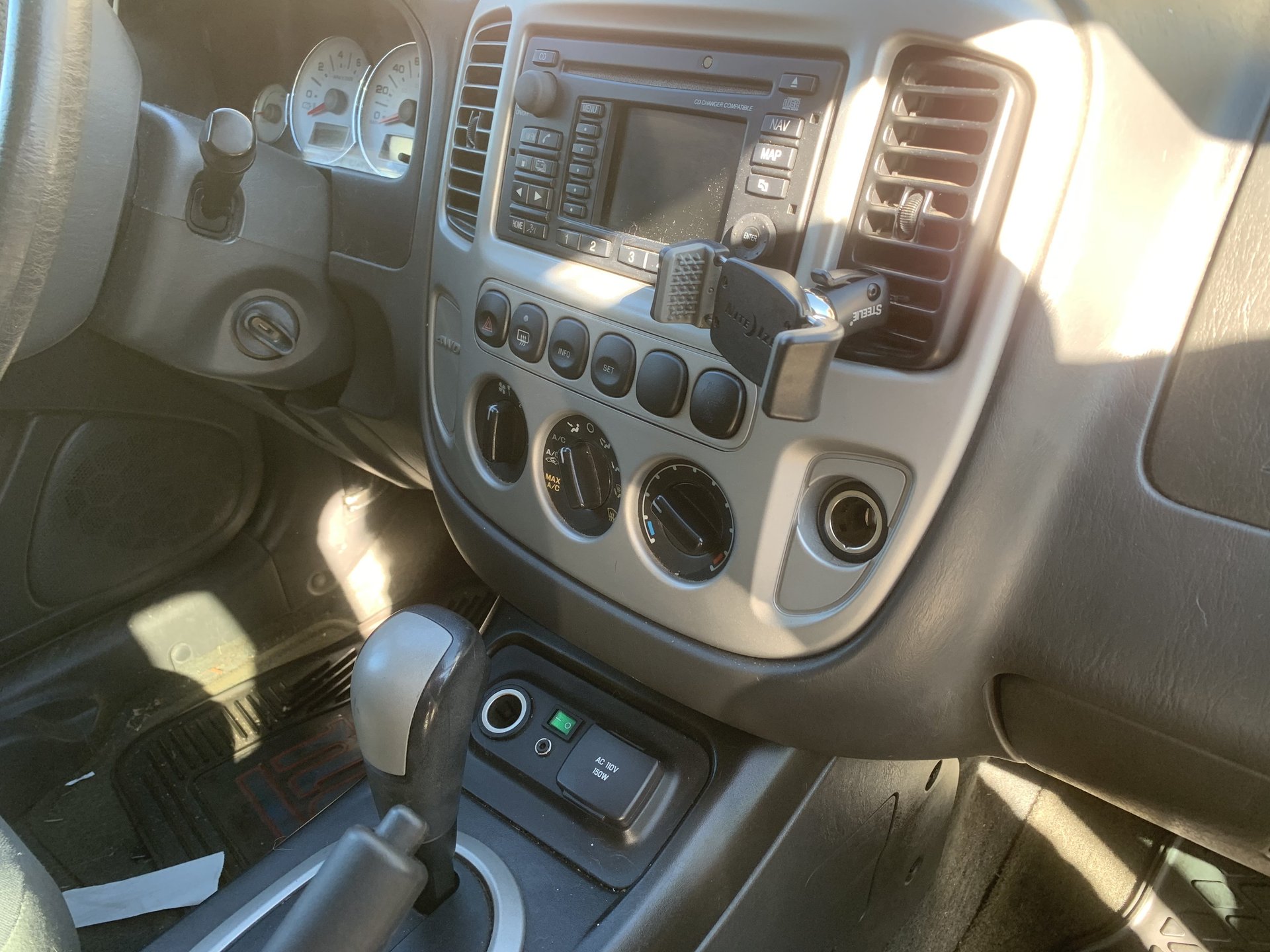 2006 Escape Hybrid with a mystery Aux In Port; can't figure out how to use  it. | Ford Escape Automobiles Forum