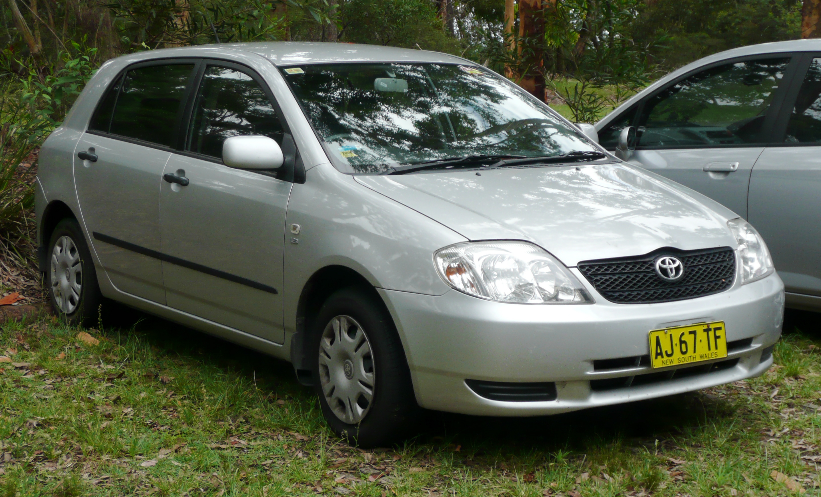 File:2001-2002 Toyota Corolla Ascent hatchback 01.jpg - Wikimedia Commons