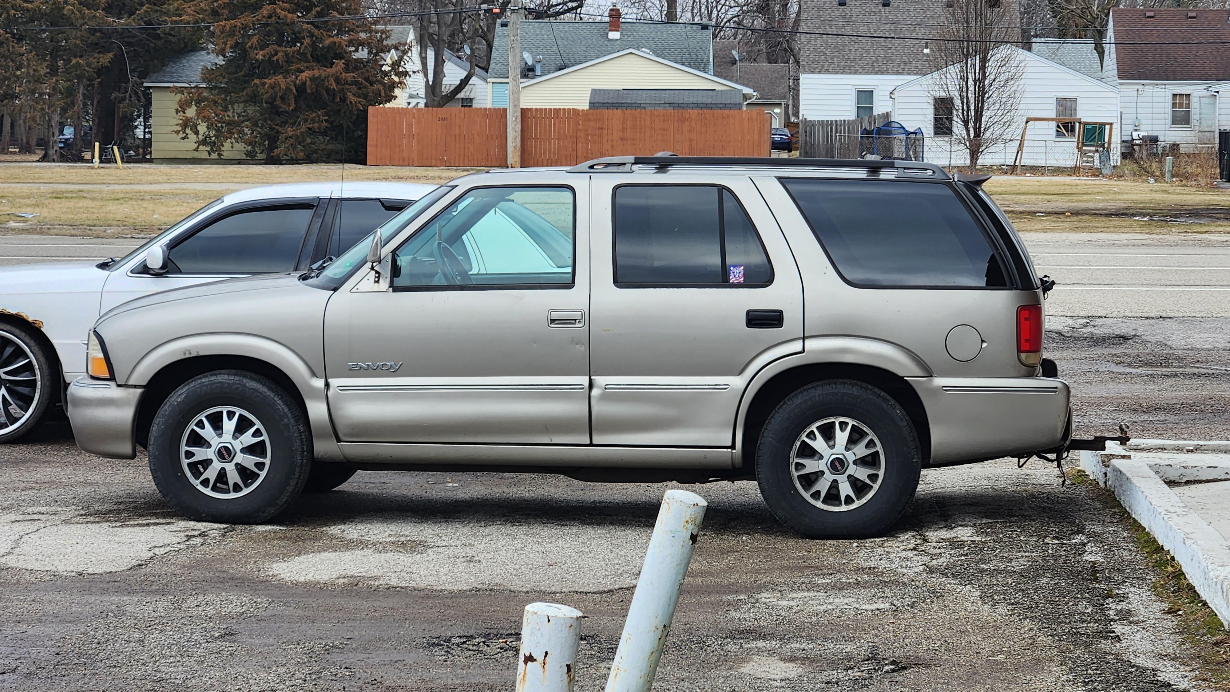 This is my first time seeing a 1st gen GMC Envoy in the wild. My first  first time seeing one was my friends Envoy we dubbed "The Turd" because of  its shitbox