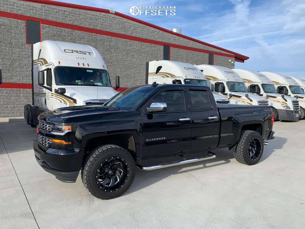 2019 Chevrolet Silverado 1500 LD with 20x12 -44 Fuel Cleaver and 305/55R20  General Grabber Atx and Leveling Kit | Custom Offsets