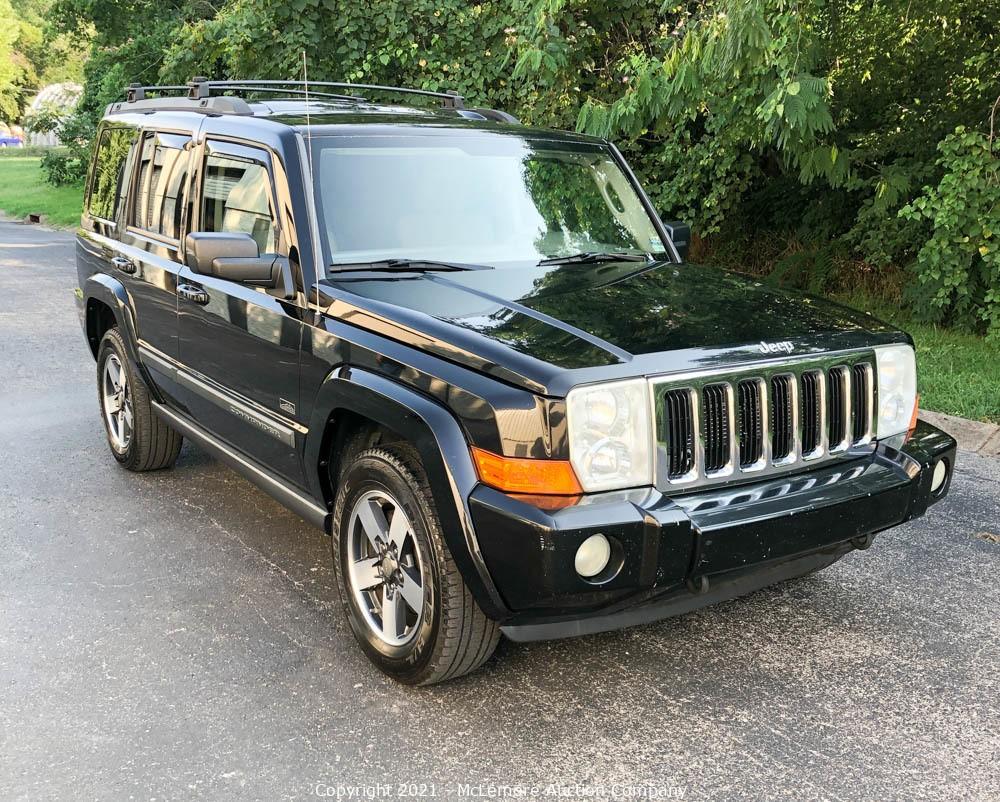 McLemore Auction Company - Auction: 2008 Jeep Commander Rocky Mountain 4x4,  2000 Aries Fiberglass Fishing Boat with Mercury 200HP Outboard, Mowers,  Tools, Building Materials and More ITEM: 2008 Jeep Commander with a 3.7L