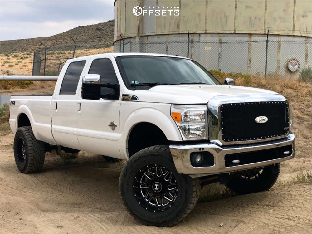 2012 Ford F-350 Super Duty with 20x10 -19 Hostile Sprocket and 37/13.5R20  Toyo Tires Open Country R/T and Suspension Lift 6" | Custom Offsets