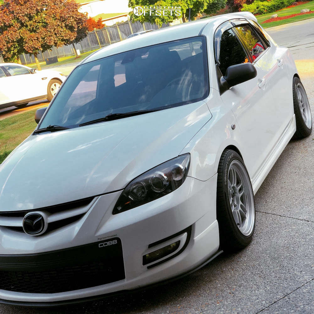 2007 Mazda MazdaSpeed3 with 17x9 35 Enkei RPF1 and 245/45R17 Hankook Ventus  V12 Evo 2 and Coilovers | Custom Offsets