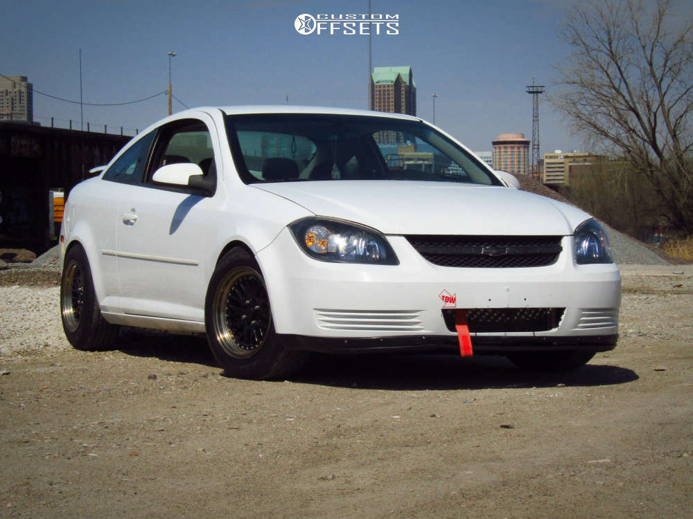 2010 Chevrolet Cobalt with 15x8 25 AVID1 AV12 and 195/65R15 Cooper  Evolution Tour and Coilovers | Custom Offsets