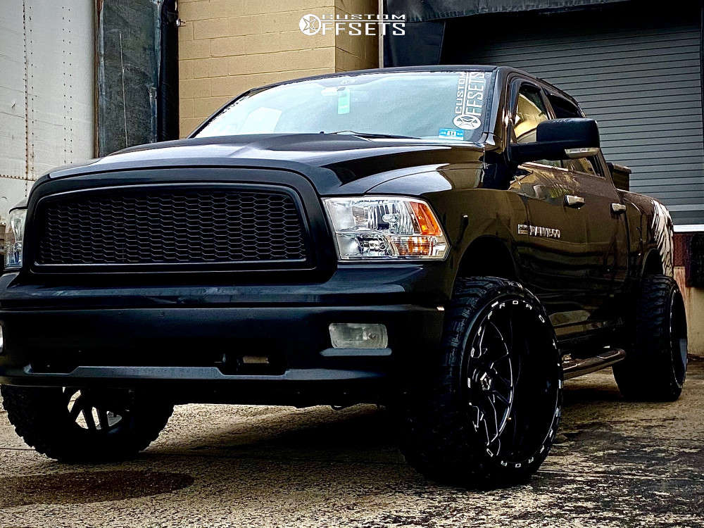 2011 Dodge Ram 1500 with 24x14 -76 TIS 544BM and 33/13.5R24 Atturo Trail  Blade Mt and Suspension Lift 2.5" | Custom Offsets