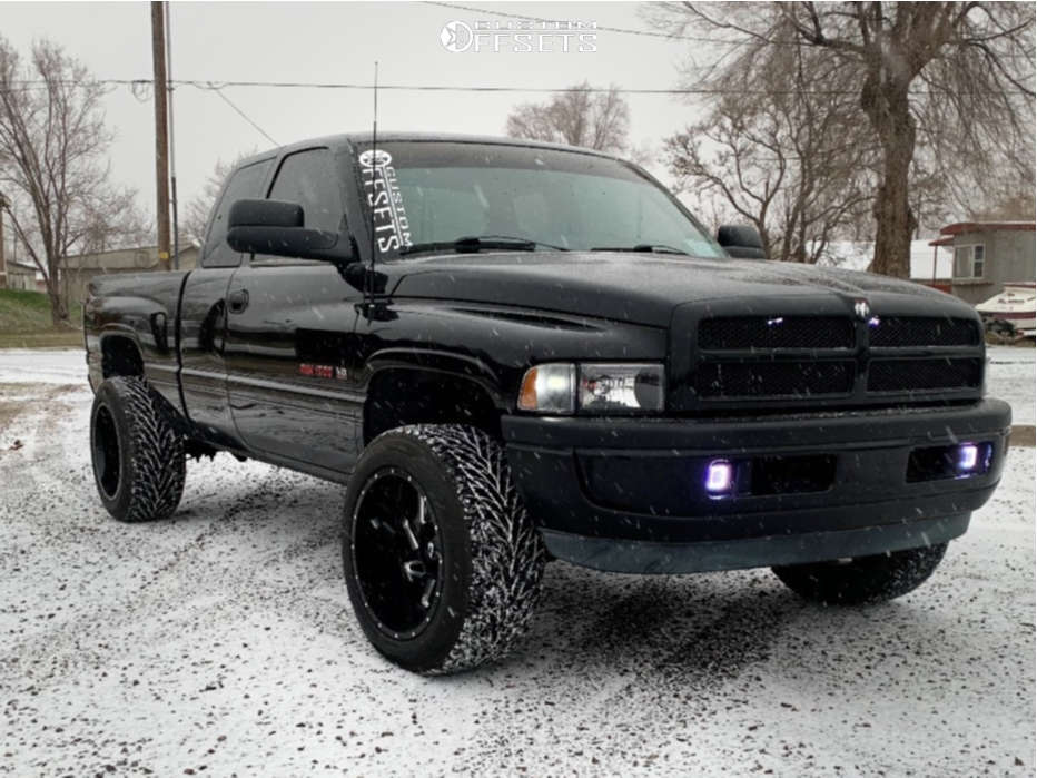 1997 Dodge Ram 1500 with 20x12 -51 Vision Spyder and 305/50R20 Toyo Tires  Proxes ST III and Level 2" Drop Rear | Custom Offsets