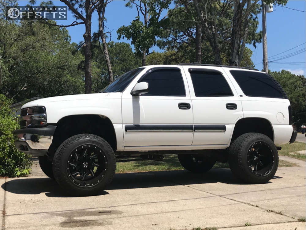 2001 Chevrolet Tahoe with 20x14 -76 Cali Offroad Twisted and 35/12.5R20  Toyo Tires Open Country A/T III and Suspension Lift 6" | Custom Offsets