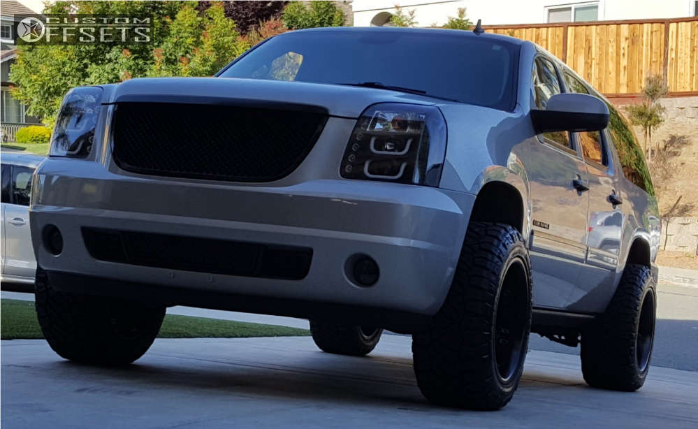 2009 GMC Yukon XL 1500 with 20x12 -44 Fuel Octane and 33/12.5R20 Nitto  Ridge Grappler and Leveling Kit | Custom Offsets