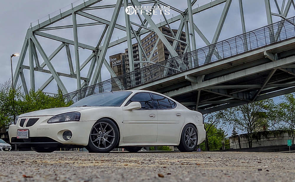 2004 Pontiac Grand Prix with 18x8 40 Niche Misano and 245/45R18 Continental  Extreme Contact Dws06 and Coilovers | Custom Offsets
