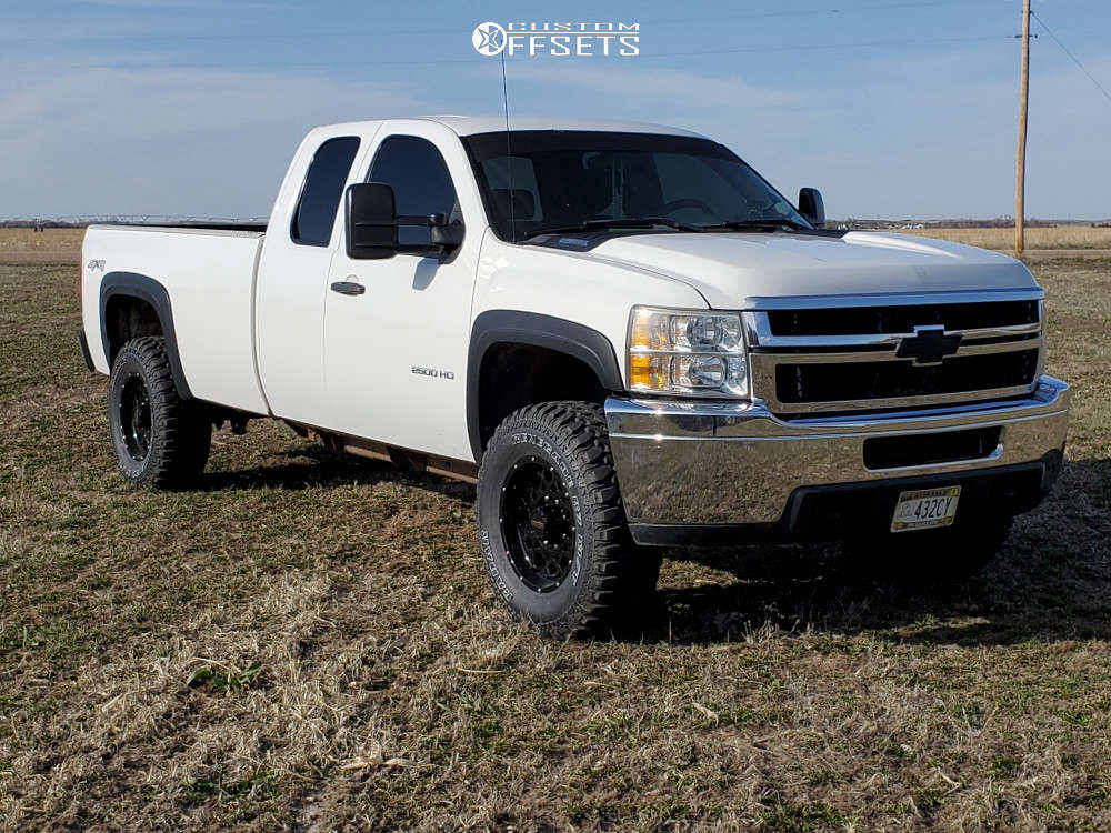 2011 Chevrolet Silverado 2500 HD with 18x9 12 Vision Rocker and 35/12.5R18  Radar Renegade R7 Mt and Leveling Kit | Custom Offsets