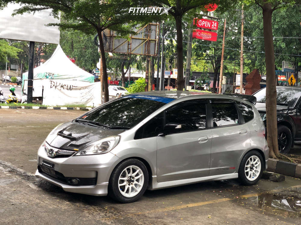 2011 Honda Fit Sport with 15x6.5 Work Cr Kai and GT Radial 195x55 on  Lowering Springs | 1639104 | Fitment Industries
