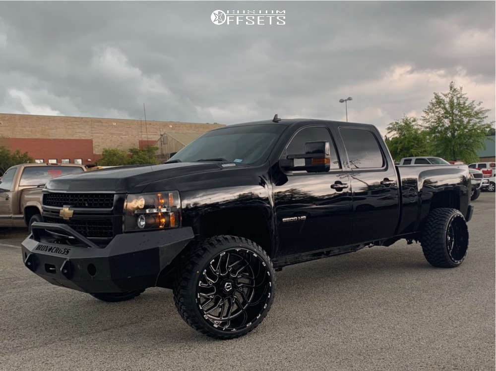 2009 Chevrolet Silverado 2500 HD with 24x14 -76 TIS 544BM and 33/12.5R24  RBP Repulsor Mt and Leveling Kit | Custom Offsets