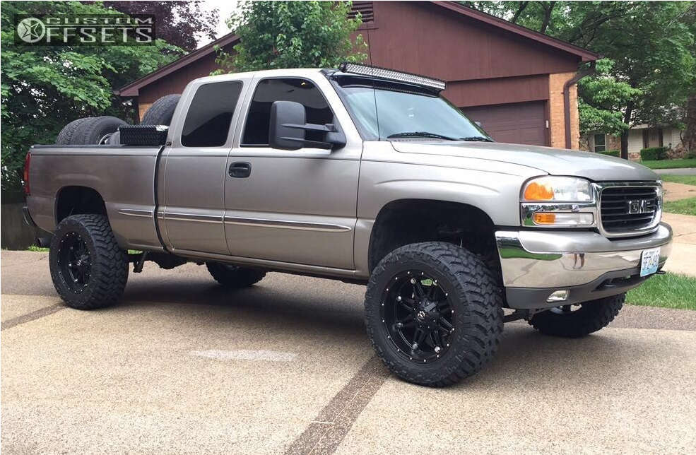 2001 GMC Sierra 1500 with 20x10 -24 Fuel Hostage and 33/12.5R20 Nitto Trail  Grappler and Suspension Lift 6" | Custom Offsets