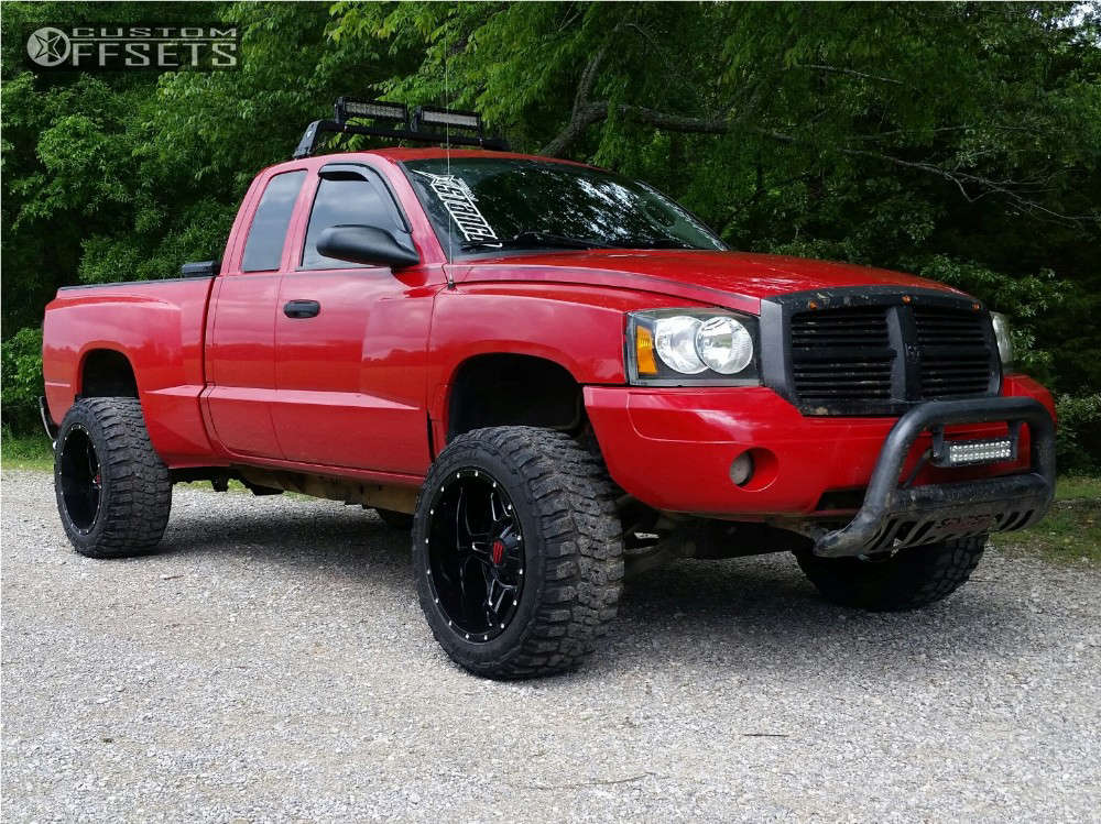 2006 Dodge Dakota with 20x12 -44 Monster Energy 538bm and 33/12.5R20  Federal Couragia Mt and Leveling Kit & Body Lift | Custom Offsets