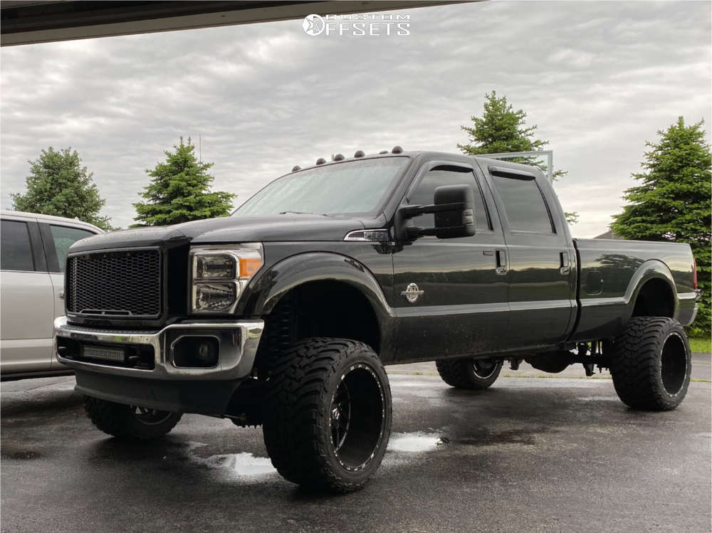 2014 Ford F-350 with 22x14 -76 TIS 544BM and 35/15.5R22 AMP Mud Terrain  Attack Mt A and Suspension Lift 6" | Custom Offsets