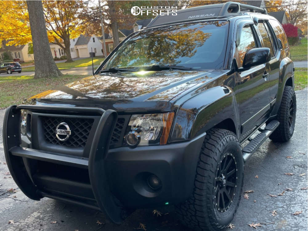 2010 Nissan Xterra with 17x9 30 XD Xd818 Heist and 33/11.5R17 Falken  Wildpeak At3w and Stock | Custom Offsets