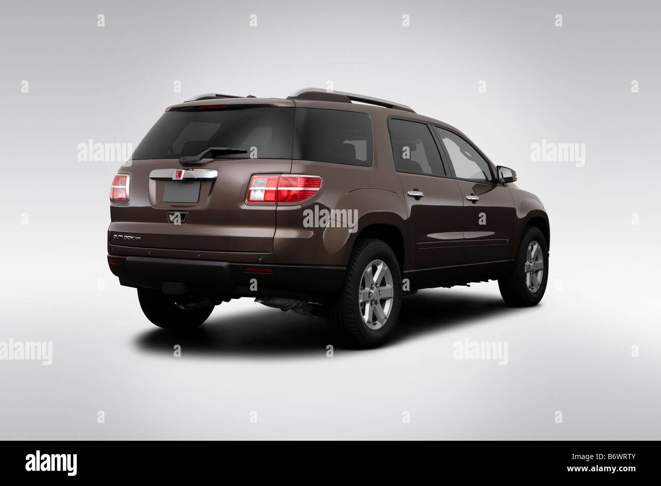 2009 Saturn Outlook XE in Brown - Rear angle view Stock Photo - Alamy