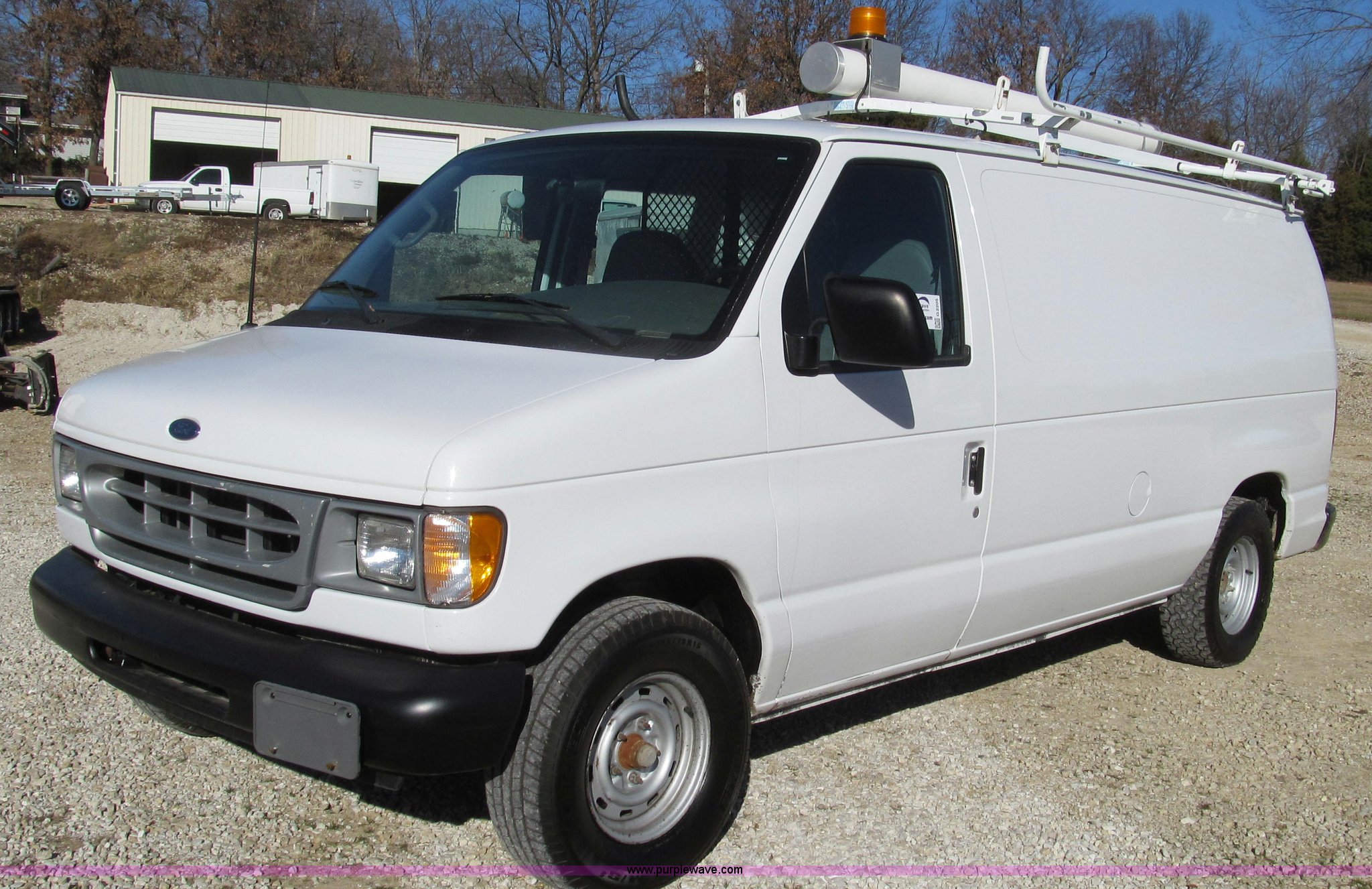 2001 Ford Econoline E150 van in Jefferson City, MO | Item G2205 sold |  Purple Wave