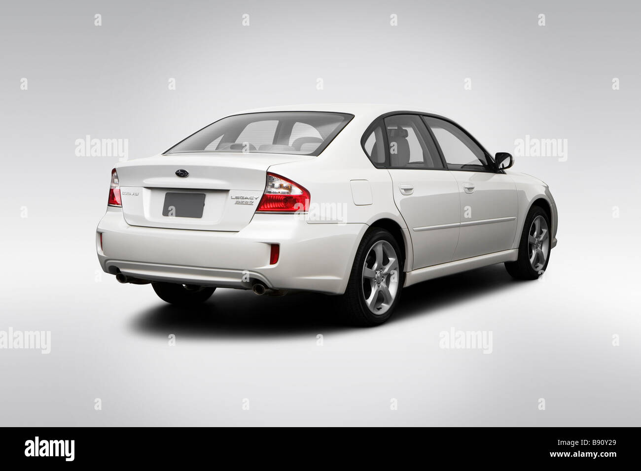 2009 Subaru Legacy 2.5i in White - Rear angle view Stock Photo - Alamy