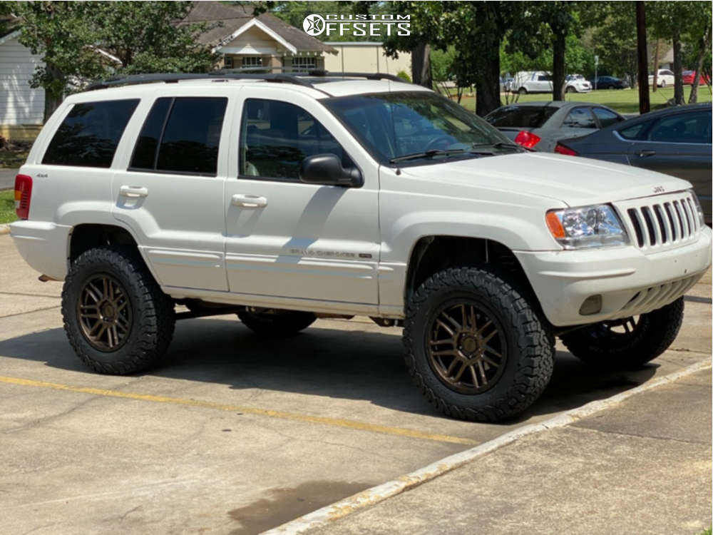 2000 Jeep Grand Cherokee with 18x8 30 Black Rhino Arches and 32/10.5R18  BFGoodrich All Terrain TA KO2 and Suspension Lift 4" | Custom Offsets