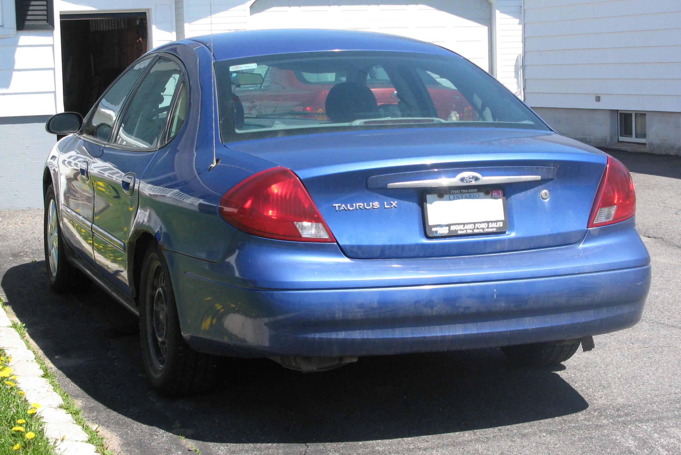 File:2003 Ford Taurus LX, Rear Left, 05-20-2020.jpg - Wikimedia Commons