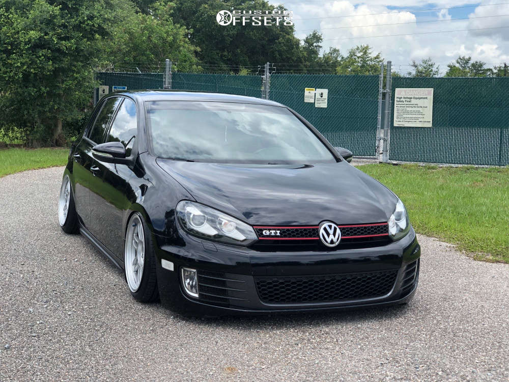 2013 Volkswagen GTI with 17x9 22 Enkei RPF1 and 205/40R17 Nankang NS-25 and  Air Suspension | Custom Offsets