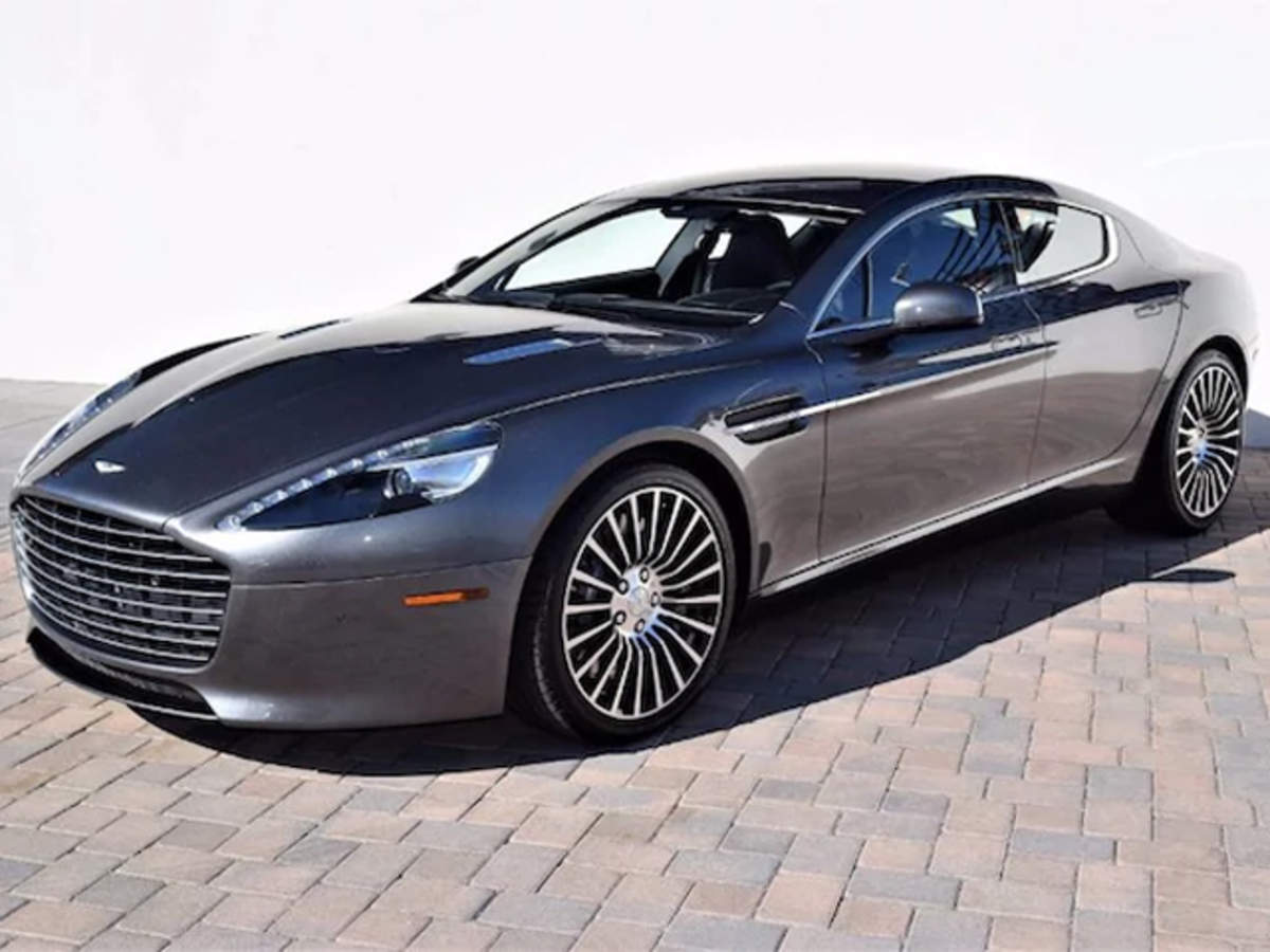 Aston Martin Rapide: Why James Bond's Aston Martin Rapide worth $240,000  can't rev it up like the Tesla - The Economic Times