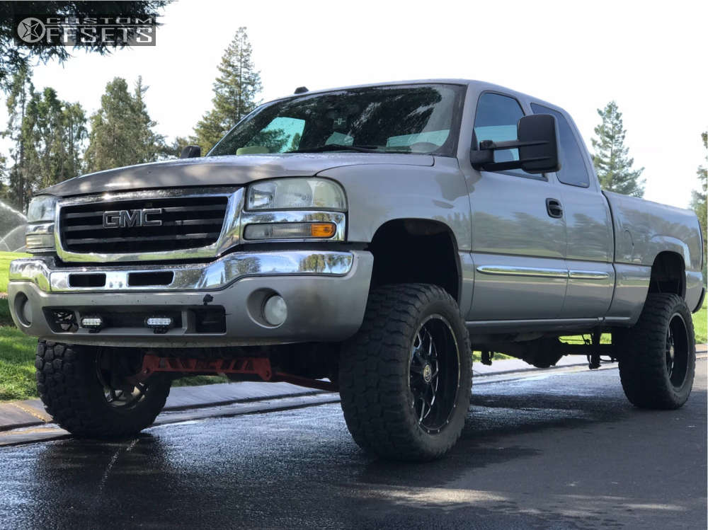 2004 GMC Sierra 1500 with 20x10 -19 Hardrock Gunner H705 and 33/12.5R20  Ironman All Country Mt and Suspension Lift 6" | Custom Offsets