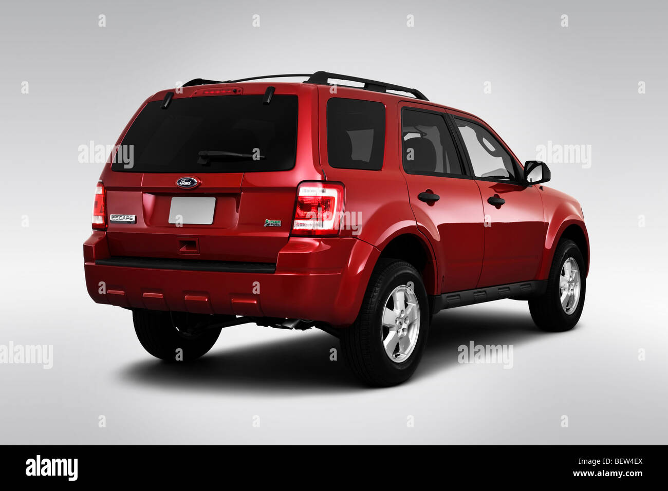 2010 Ford Escape XLT in Red - Rear angle view Stock Photo - Alamy