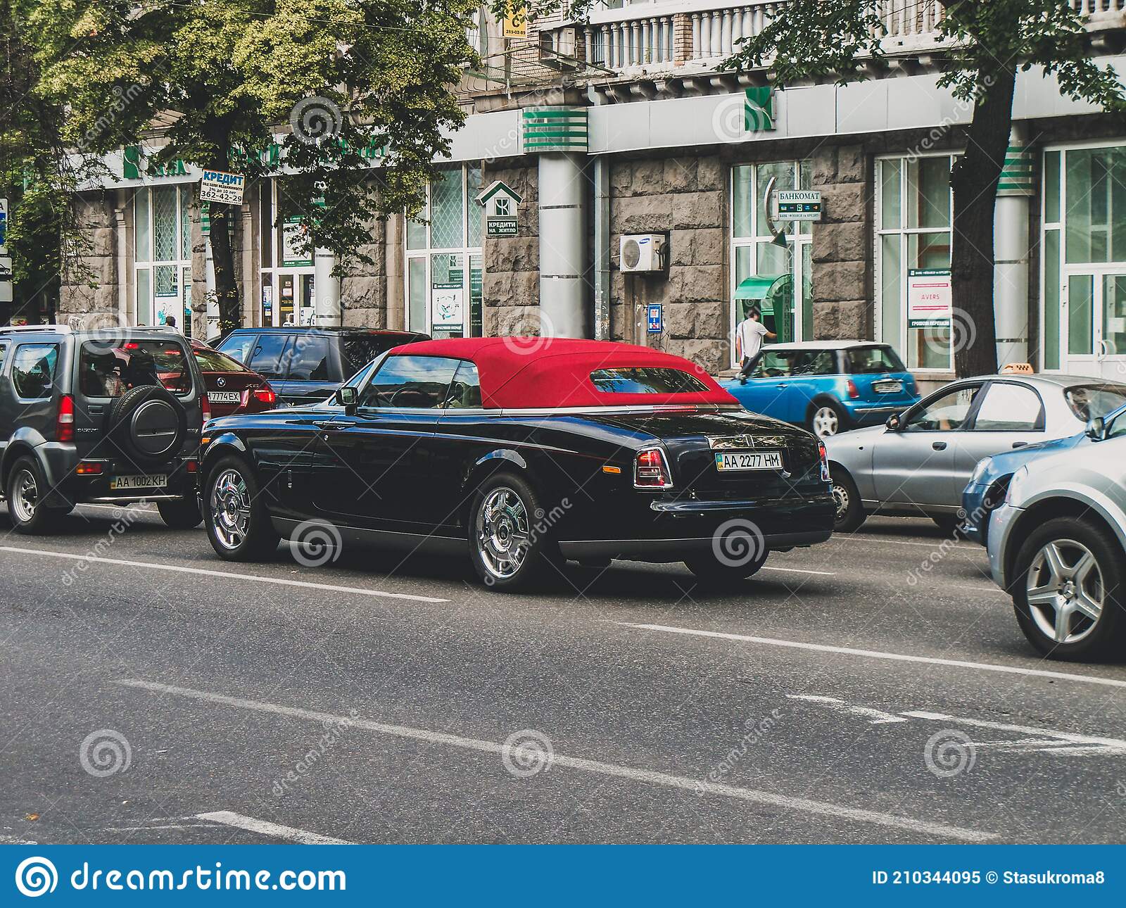 Kiev, Ukraine - June 11, 2011: Luxury Car Rolls-Royce Phantom Drophead Coupe  in the City. Black Car with Red Roof Editorial Image - Image of power,  front: 210344095