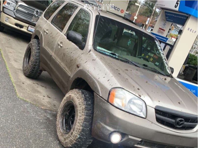 2002 Mazda Tribute with 15x10 -39 Vision D Window and 31/10.5R15 Milestar  Patagonia Mt and Leveling Kit | Custom Offsets