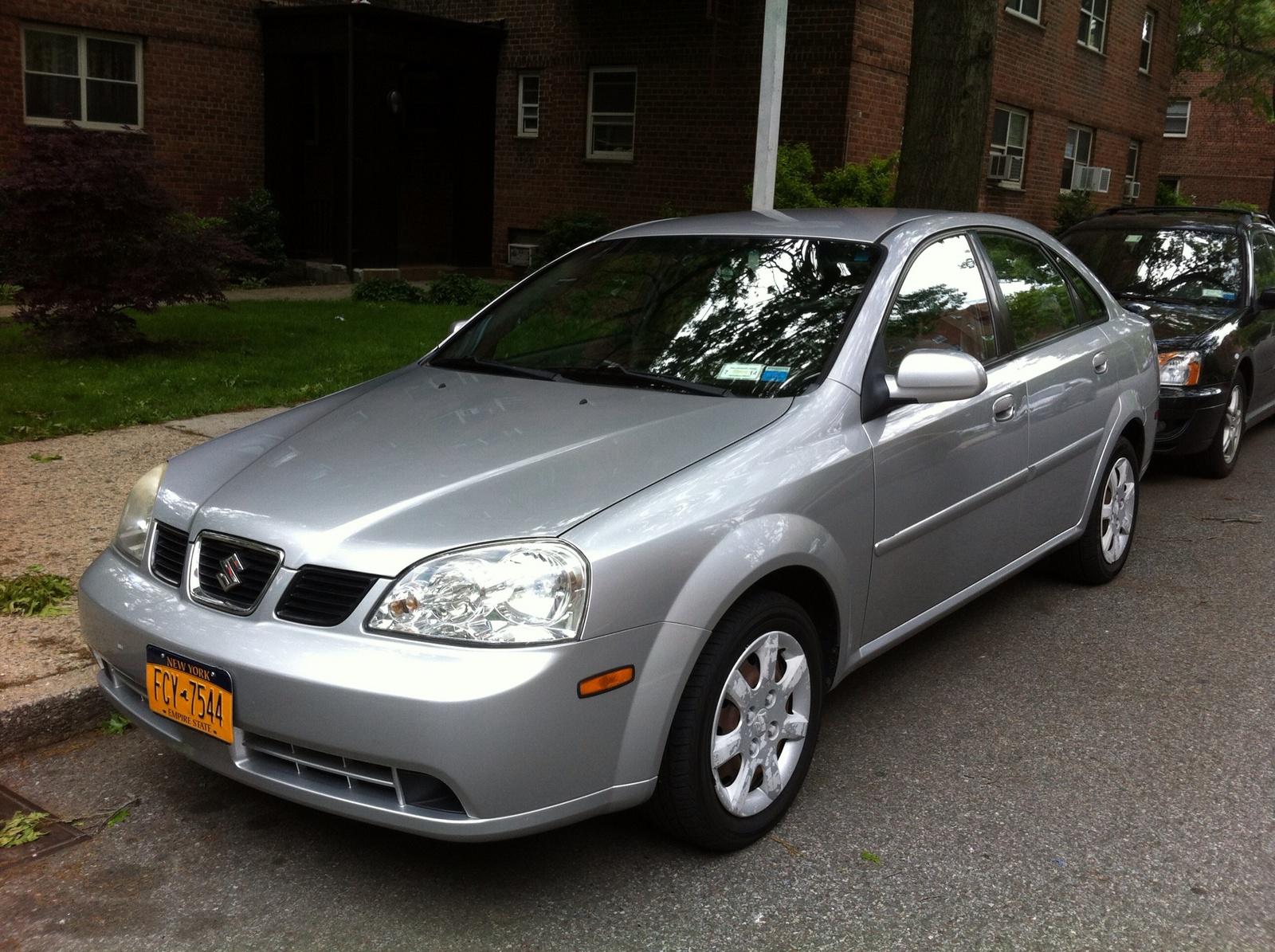2005 Suzuki Forenza. The official car of the "global market", coming with a  who gives a shit inline 4, and constantly leaking oil because it's a  Daewoo, and also GM. : r/regularcarreviews